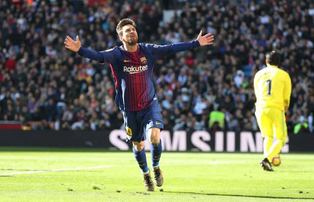 Soccer Football - La Liga Santander - Real Madrid vs FC Barcelona - Santiago Bernabeu, Madrid, Spain - December 23, 2017 Barcelona’s Lionel Messi celebrates scoring their second goal REUTERS/Sergio Perez