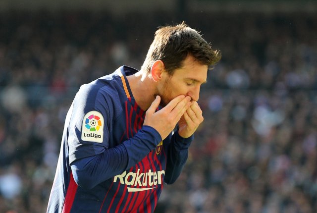 Soccer Football - La Liga Santander - Real Madrid vs FC Barcelona - Santiago Bernabeu, Madrid, Spain - December 23, 2017 Barcelona’s Lionel Messi celebrates scoring their second goal REUTERS/Sergio Perez