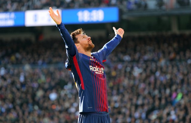 Soccer Football - La Liga Santander - Real Madrid vs FC Barcelona - Santiago Bernabeu, Madrid, Spain - December 23, 2017 Barcelona’s Lionel Messi celebrates scoring their second goal REUTERS/Sergio Perez