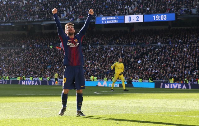 Soccer Football - La Liga Santander - Real Madrid vs FC Barcelona - Santiago Bernabeu, Madrid, Spain - December 23, 2017 Barcelona’s Lionel Messi celebrates scoring their second goal REUTERS/Sergio Perez