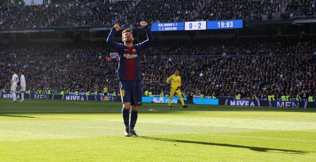 Soccer Football - La Liga Santander - Real Madrid vs FC Barcelona - Santiago Bernabeu, Madrid, Spain - December 23, 2017 Barcelona’s Lionel Messi celebrates scoring their second goal REUTERS/Sergio Perez