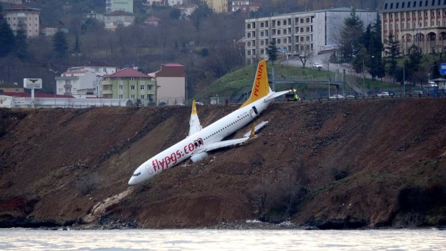 A Pegasus Airlines aircraft is pictured after it skidded off the runway at Trabzon airport by the Black Sea in Trabzon, Turkey, January 14, 2018. Muhammed Kacar/Dogan News Agency via REUTERS ATTENTION EDITORS - THIS PICTURE WAS PROVIDED BY A THIRD PARTY. NO RESALES. NO ARCHIVE. TURKEY OUT. NO COMMERCIAL OR EDITORIAL SALES IN TURKEY.