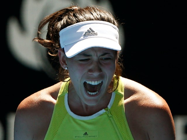 Tennis - Australian Open - Rod Laver Arena, Melbourne, Australia, January 18, 2018. Garbine Muguruza of Spain reacts during her match against Hsieh Su-Wei of Taiwan. REUTERS/Thomas Peter