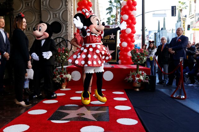 The character of Minnie Mouse poses on her star after it was unveiled on the Hollywood Walk of Fame in Los Angeles, California, U.S., January 22, 2018. REUTERS/Mario Anzuoni