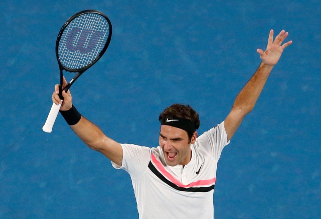 Tennis - Australian Open - Men's singles final - Rod Laver Arena, Melbourne, Australia, January 28, 2018. Roger Federer of Switzerland celebrates winning against Marin Cilic of Croatia. REUTERS/Toru Hanai   TPX IMAGES OF THE DAY