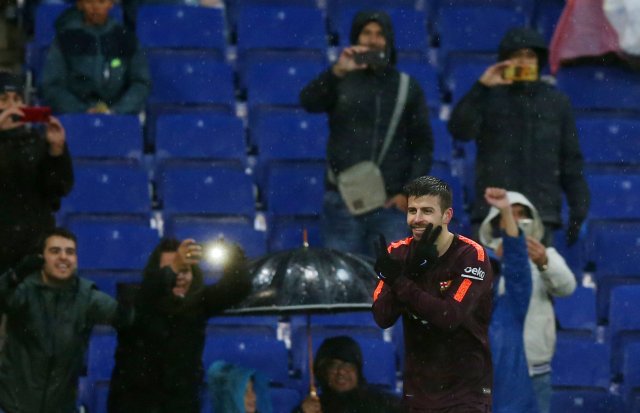 Soccer Football - La Liga Santander - Espanyol vs FC Barcelona - RCDE Stadium, Barcelona, Spain - February 4, 2018 Barcelona’s Gerard Pique celebrates scoring their first goal REUTERS/Albert Gea