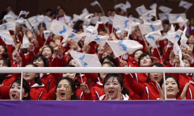 Short Track Speed Skating Events – Pyeongchang 2018 Winter Olympics – Men’s 1500m Competition – Gangneung Ice Arena - Gangneung, South Korea – February 10, 2018 - North Korean cheerleaders in action. REUTERS/John Sibley