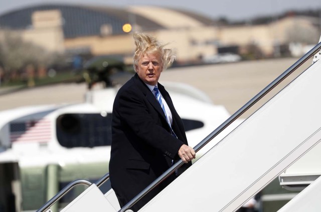 U.S. President Donald Trump boards Air Force One before departing Joint Base Andrews, Maryland en route West Virginia, U.S., April 5, 2018. REUTERS/Kevin Lamarque