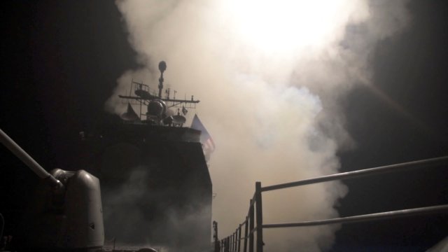 Smoke rises as the U.S. Navy guided-missile cruiser USS Monterey fires Tomahawk land attack missiles in this still image from Pentagon's video released on April 14, 2018. U.S. Navy Lt. j.g Matthew Daniels/Handout via REUTERS. ATTENTION EDITORS - THIS IMAGE WAS PROVIDED BY A THIRD PARTY