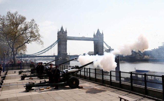 Members of the Honourable Artillery Company fire a 62-gun salute across the River Thames to mark the 92nd birthday of Britain's Queen Elizabeth, at the Tower of London, Britain April 21, 2018. REUTERS/Henry Nicholls