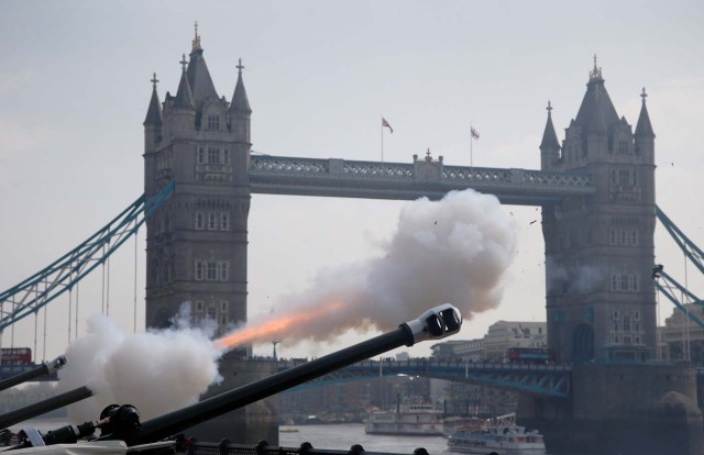 Members of the Honourable Artillery Company fire a 62-gun salute across the River Thames to mark the 92nd birthday of Britain's Queen Elizabeth, at the Tower of London, Britain April 21, 2018. REUTERS/Henry Nicholls