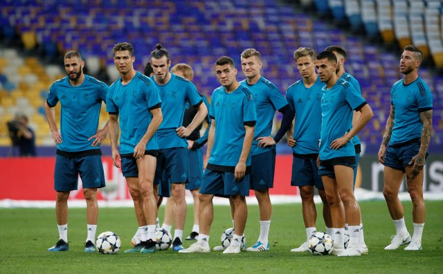 Soccer Football - Champions League Final - Real Madrid Training - NSC Olympic Stadium, Kiev, Ukraine - May 25, 2018   Real Madrid's Cristiano Ronaldo with teammates during training   REUTERS/Gleb Garanich