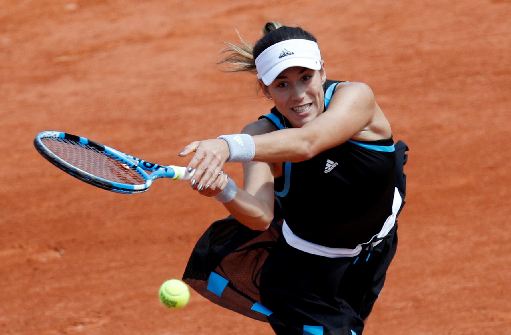 Muguruza remó contra corriente para meterse en segunda ronda de Roland Garros