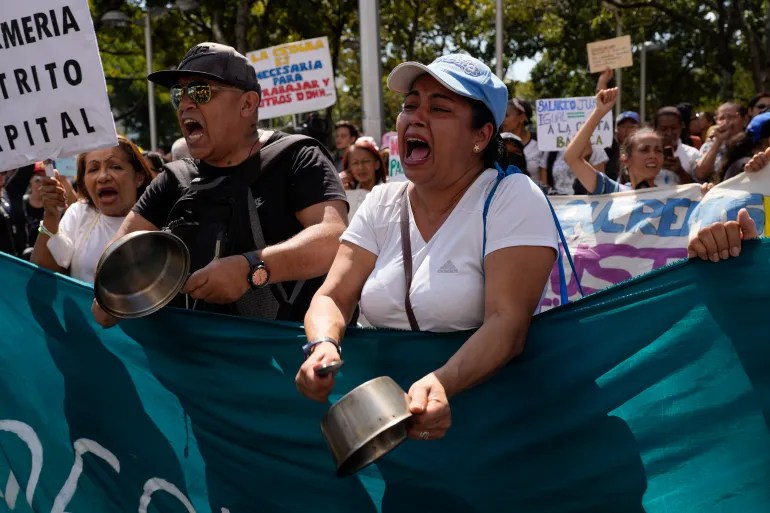 Venezuela’s teachers march for better pay amid soaring inflation